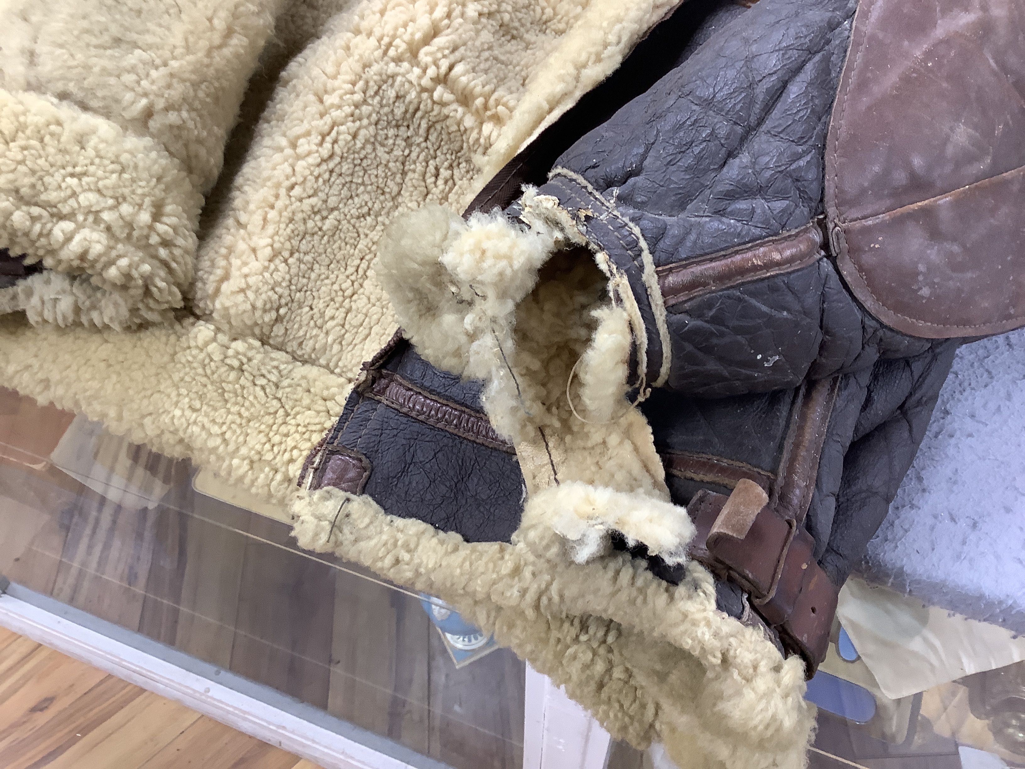 A United States Air Force Type B-3 sheepskin flying jacket, with label to collar reading; ‘Type B-3 DWG. No.33H5595 AC Order No.43-13609-AF Size 38R Property Air Force U.S. Army’
